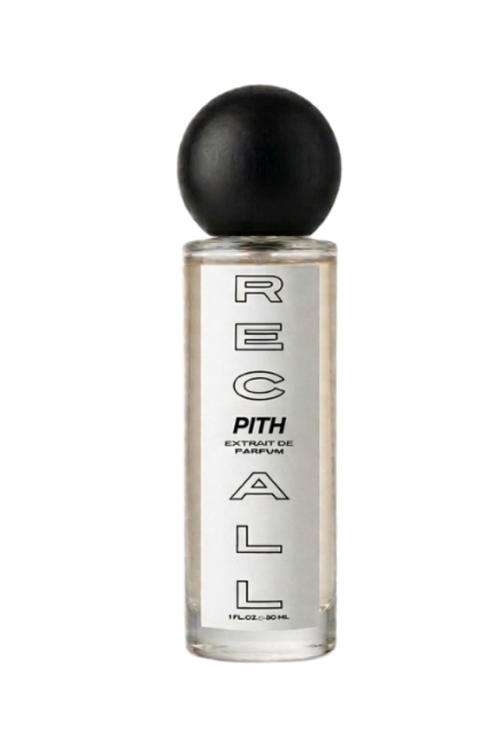 A clear glass bottle of Pith Recall Extrait de Parfum with a black spherical cap, shown against a solid white background.